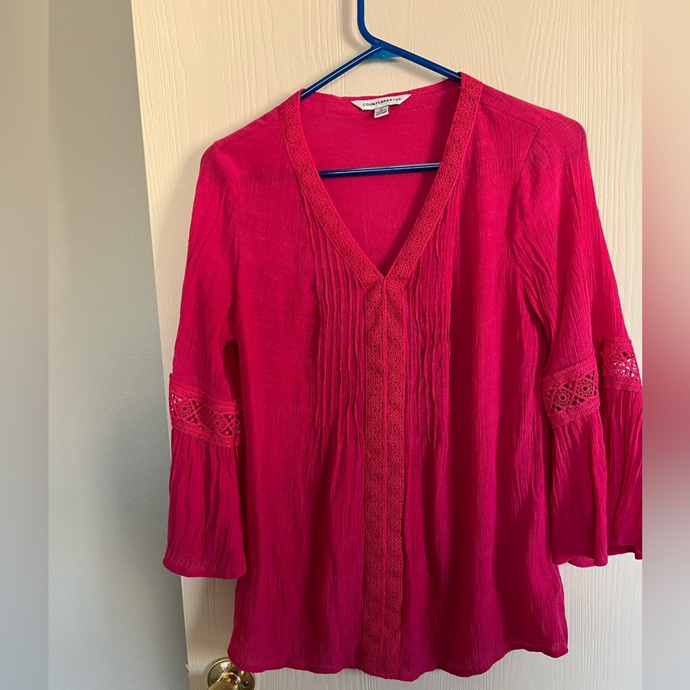 Beautiful pink blouse with lace.